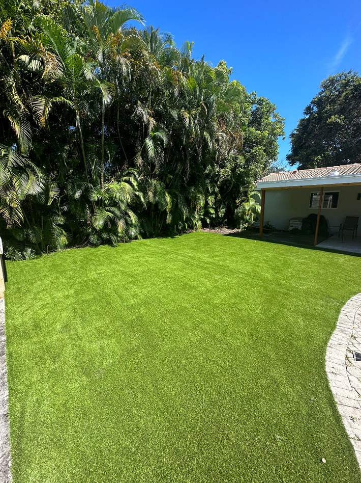 Artificial turf installed in a modern Miami backyard for low-maintenance landscaping