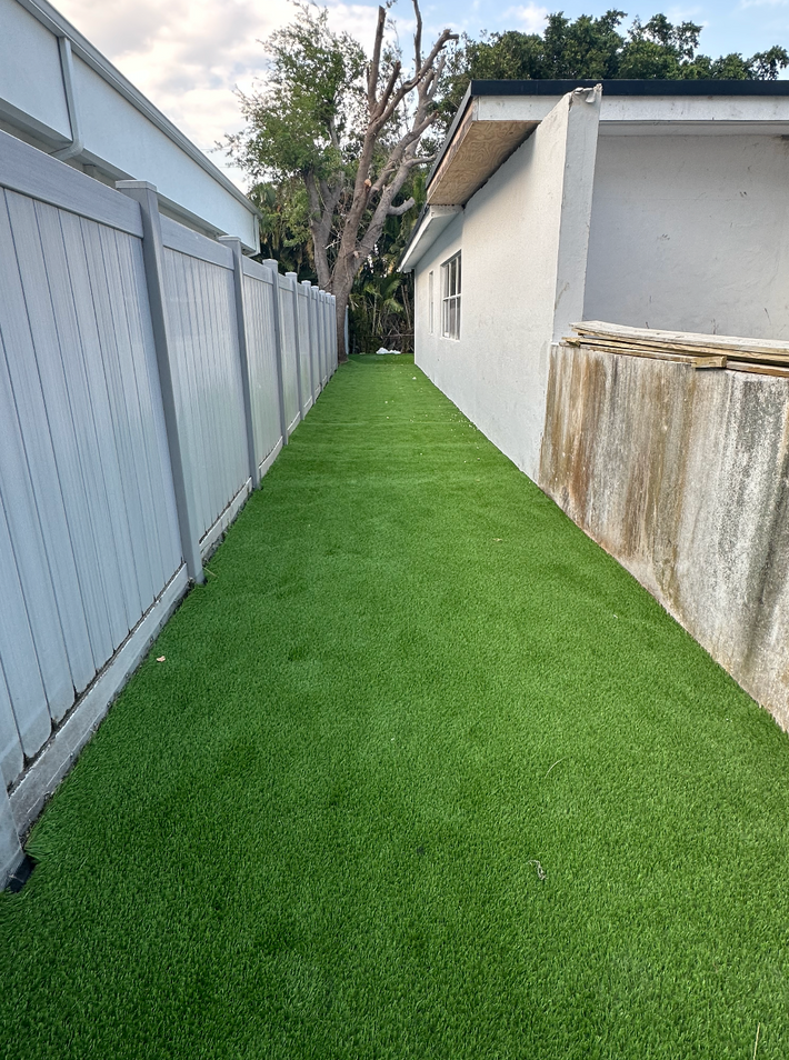 Maintenance-free artificial turf lawn installed in a residential Miami property