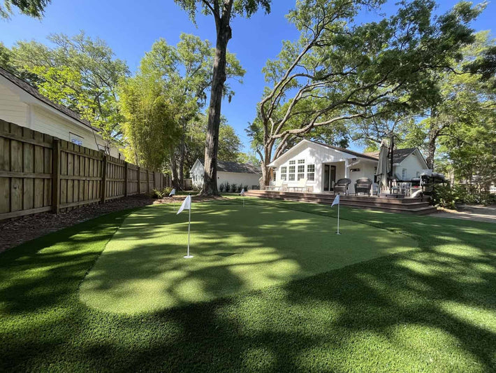 Artificial turf putting green added to residential backyard in Miami, Florida