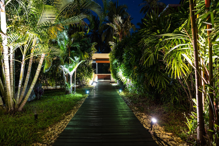 Deck and stair lighting added for safety and nighttime ambiance in a Miami backyard