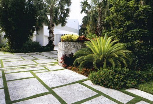 Decorative paver walkway enhancing entryway design in a Miami residential landscape