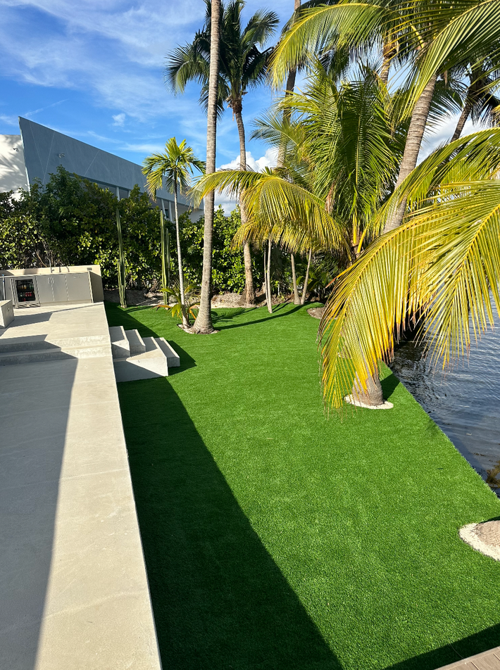 Modern patio area upgraded with artificial turf for a clean and stylish look in Miami