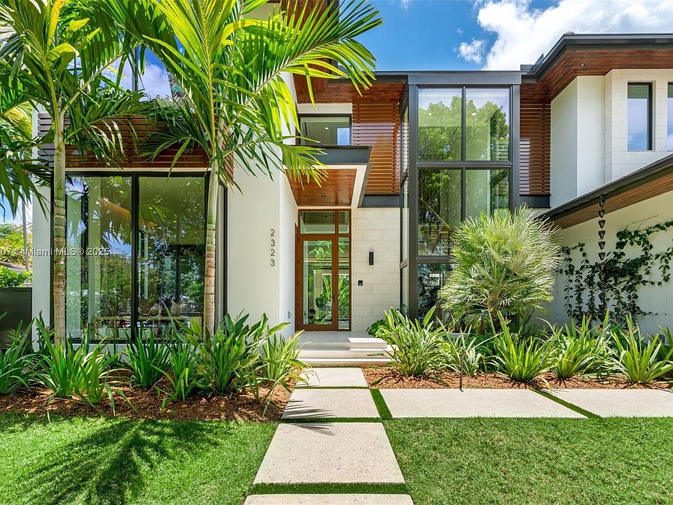 Trusted local plant installation service working on a Miami residential property