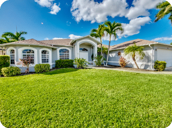 Fresh sod installation transforming a front yard in a Miami home