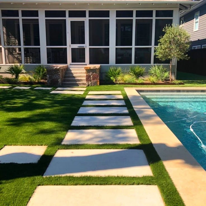 New sod lawn installed to complete a professional landscape design in Miami