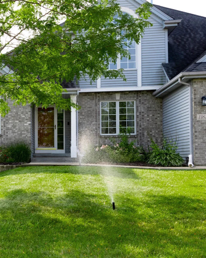 Automatic sprinkler system installed to keep Miami lawn healthy and green