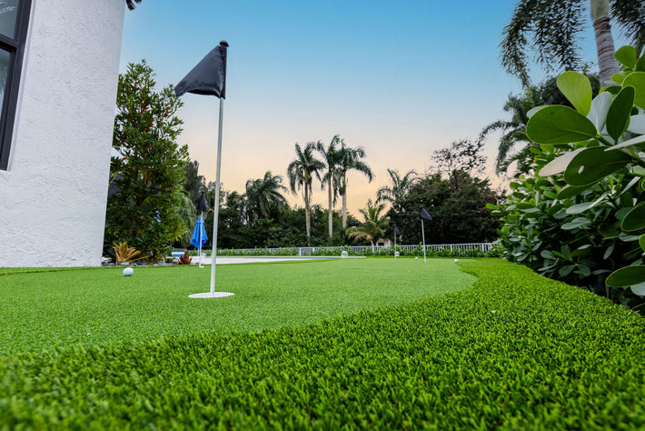Low-maintenance synthetic putting green installed for a golf-loving homeowner in Miami